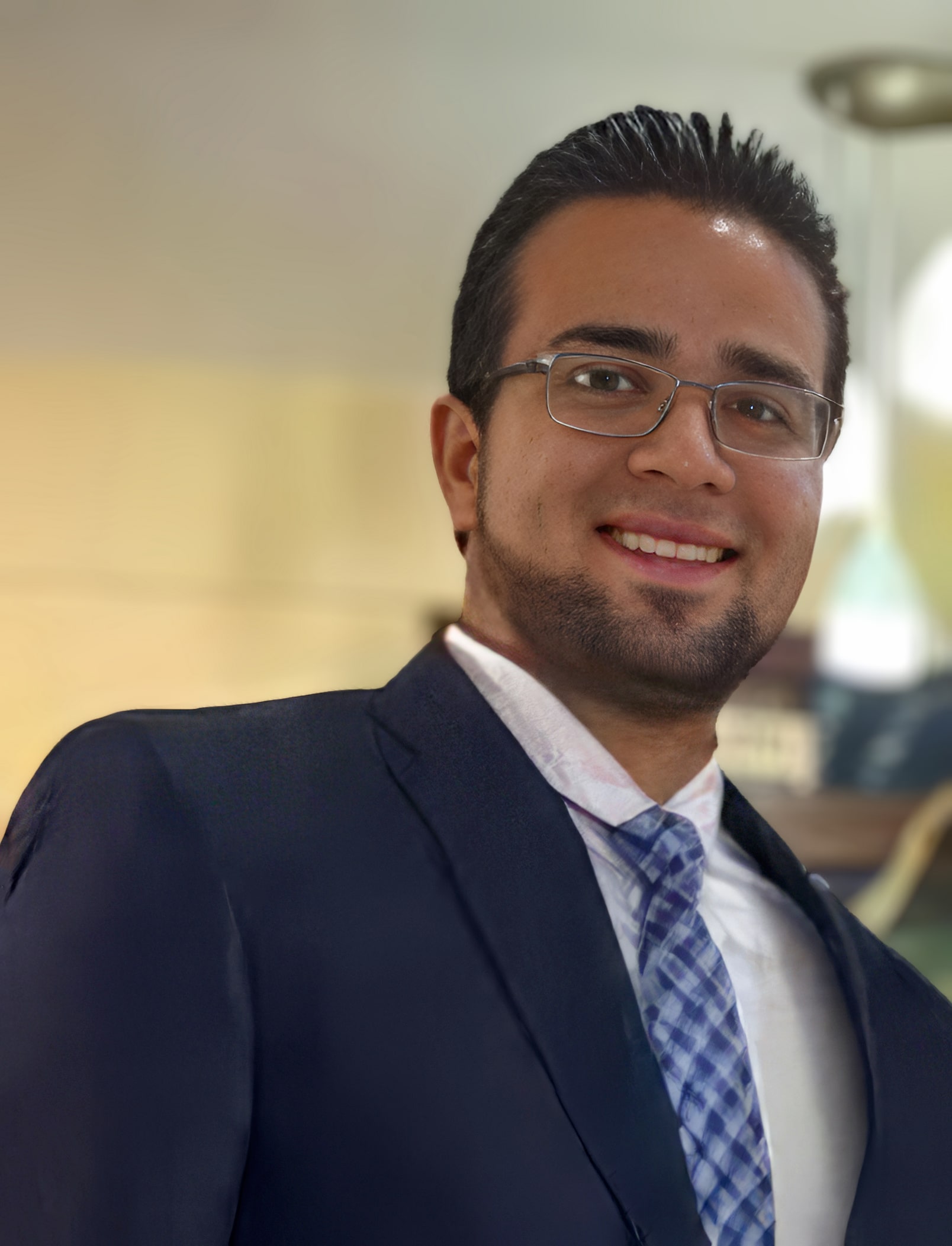 Image of Marcelo Diaz smiling with a suit on